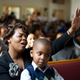 A woman prays in church. (Getty Images)